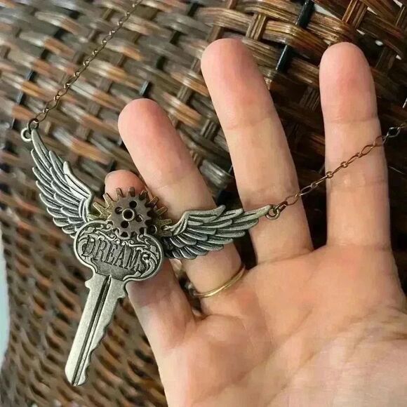 Steampunk Articulating dreams key and wings necklace with mixed metals - Picture 2 of 4